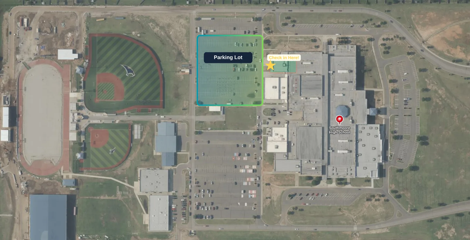 Satellite map of Southmoore High School with the parking lot and band building check-in point marked